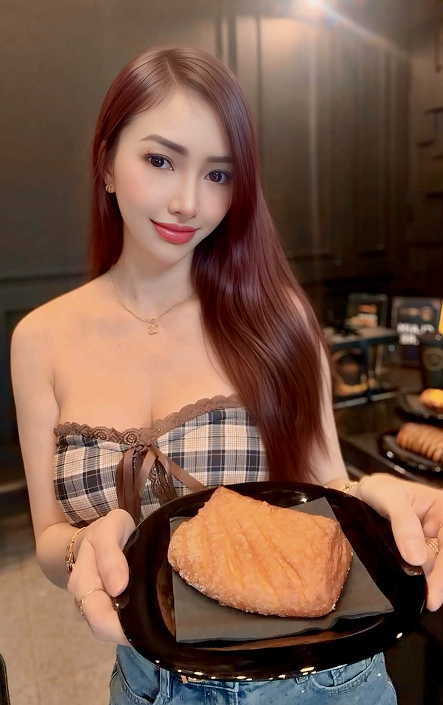 Athena Louise at Limitless Coffee & Co. in Ortigas enjoying luxury bag cake